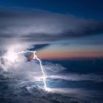 Lightning over the clouds