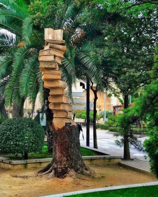 Dead tree in Guadalajara turned into book sculpture.